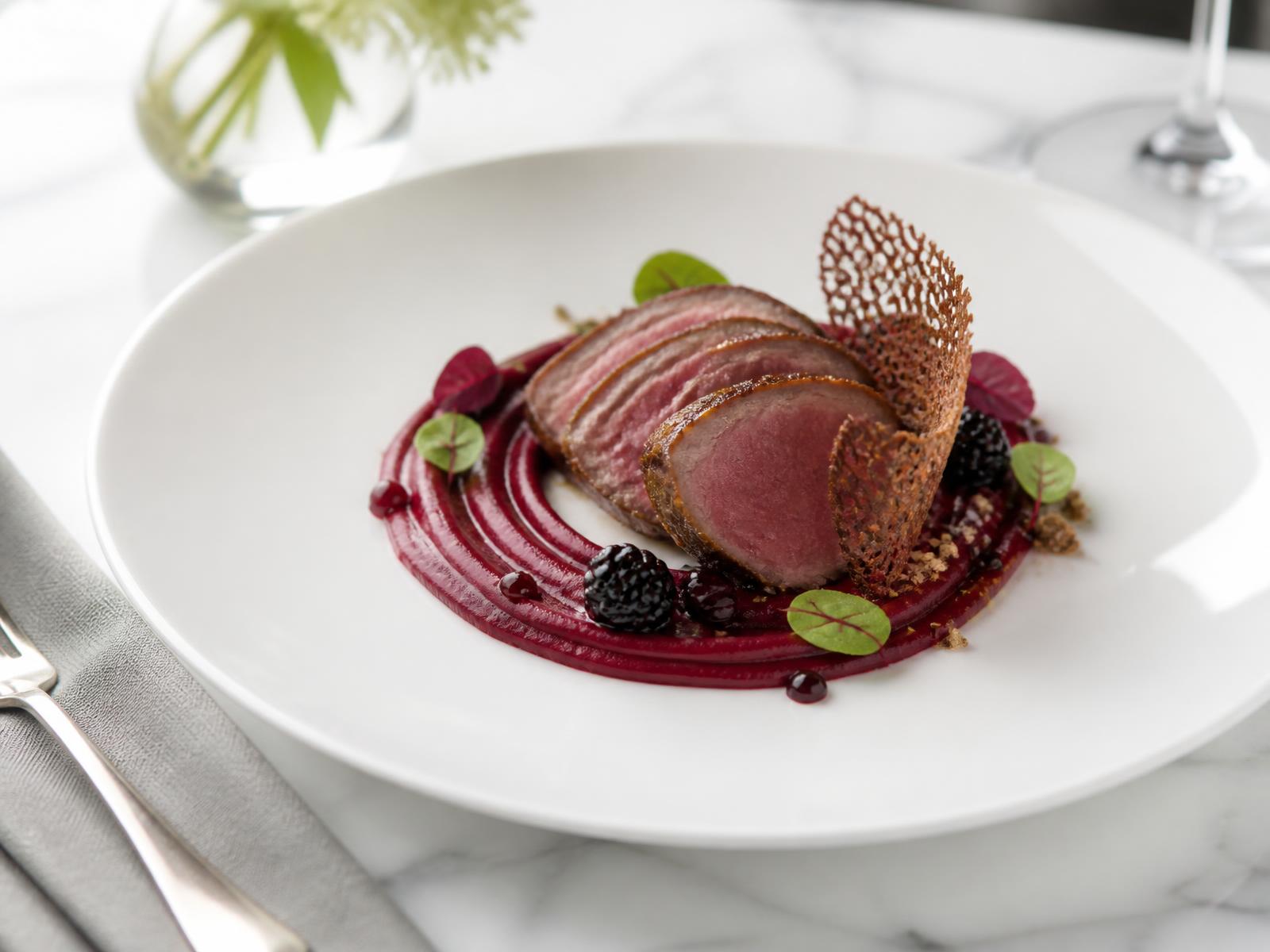 Venison loin with beetroot puree, blackberry gel and a crisp tuile